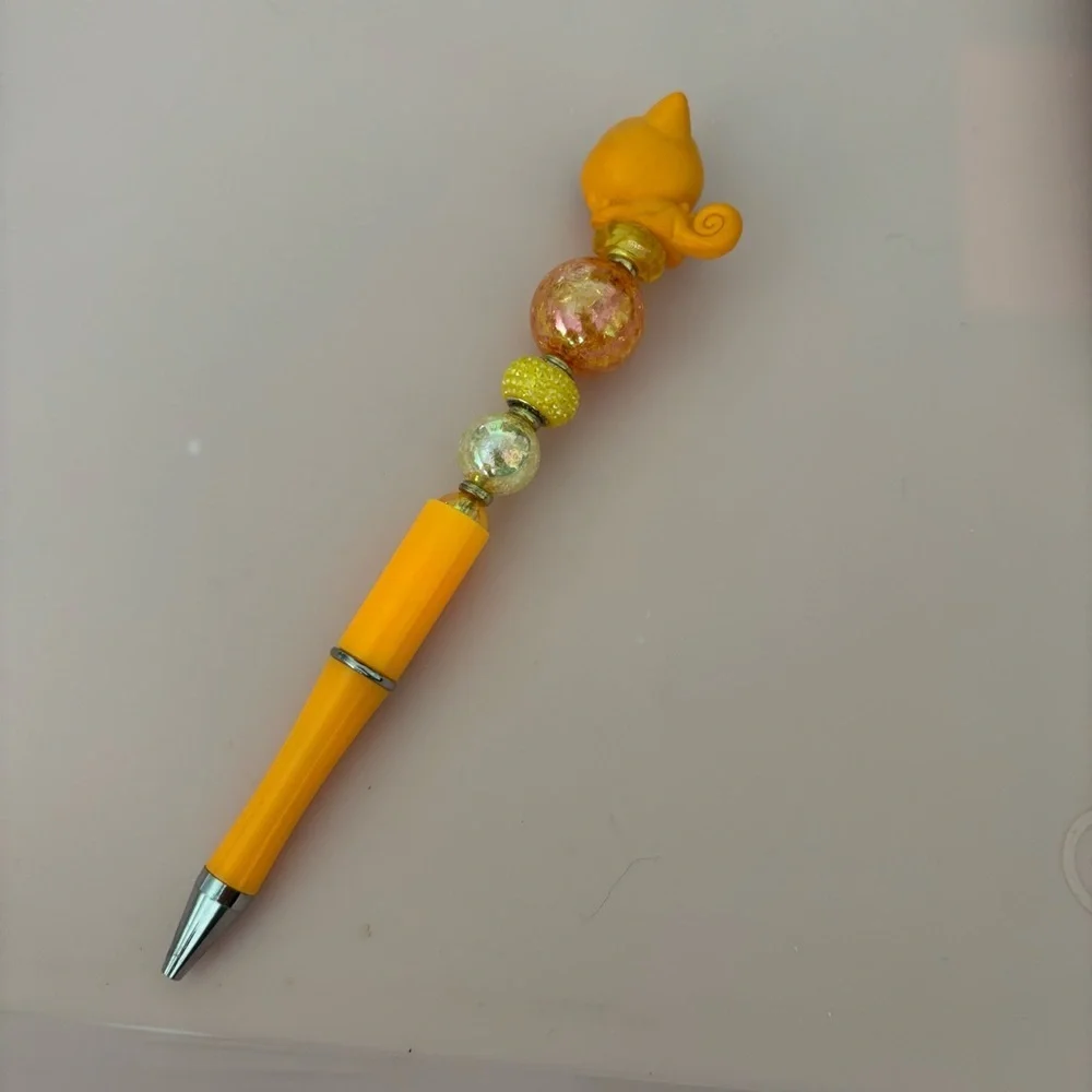 Disney Doorables: Tangled: Pascal orange handmade beaded pen